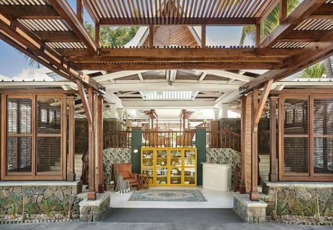 Eingangsbereich im tropischen Stil im Paradise Cove Boutique Hotel