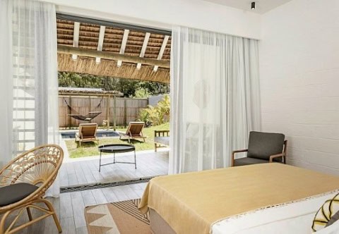 Helles Zimmer mit Terrasse im Tropical Attitude Mauritius